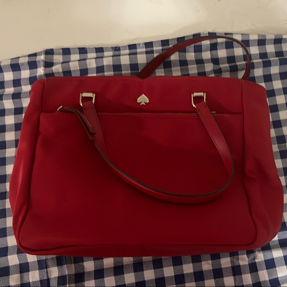 Kate Spade Stylish Red Tote Bag with Silver Accents